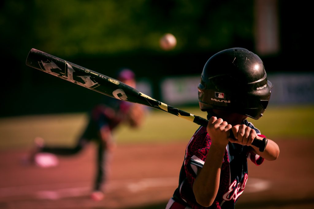 child playing baseball