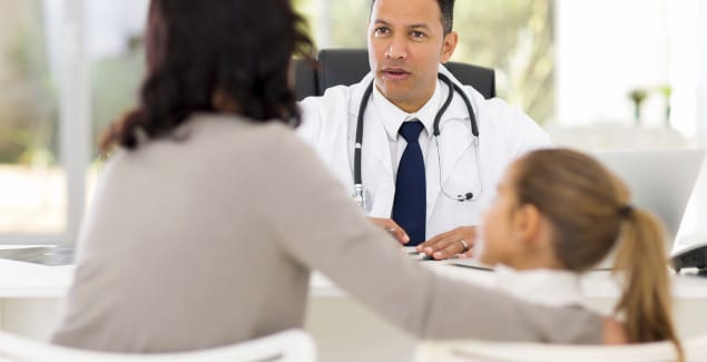 parent and child in doctors office
