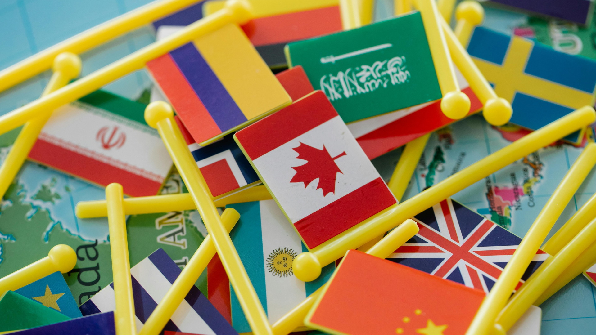 Tiny Toy Flags on Map for Cultural Appreciation